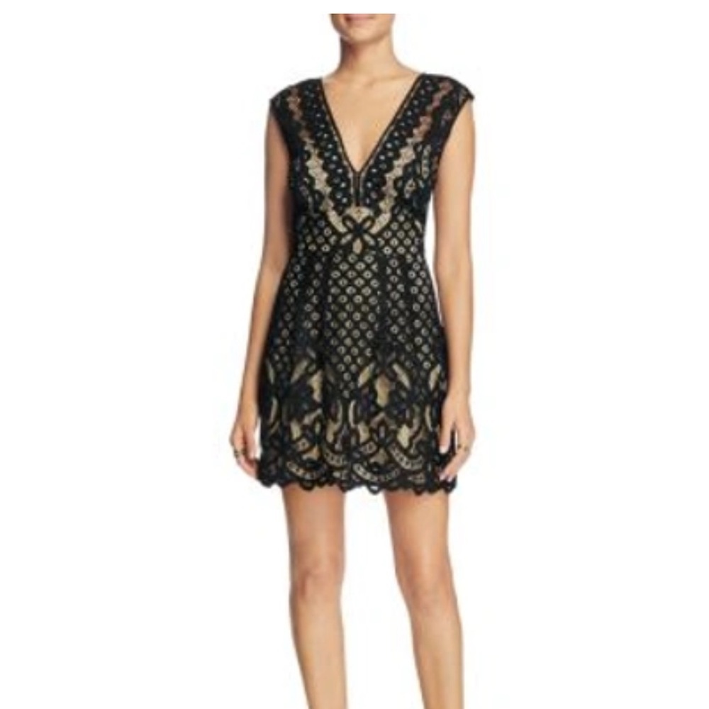 Free People One Million Lovers Lace Mini dress.